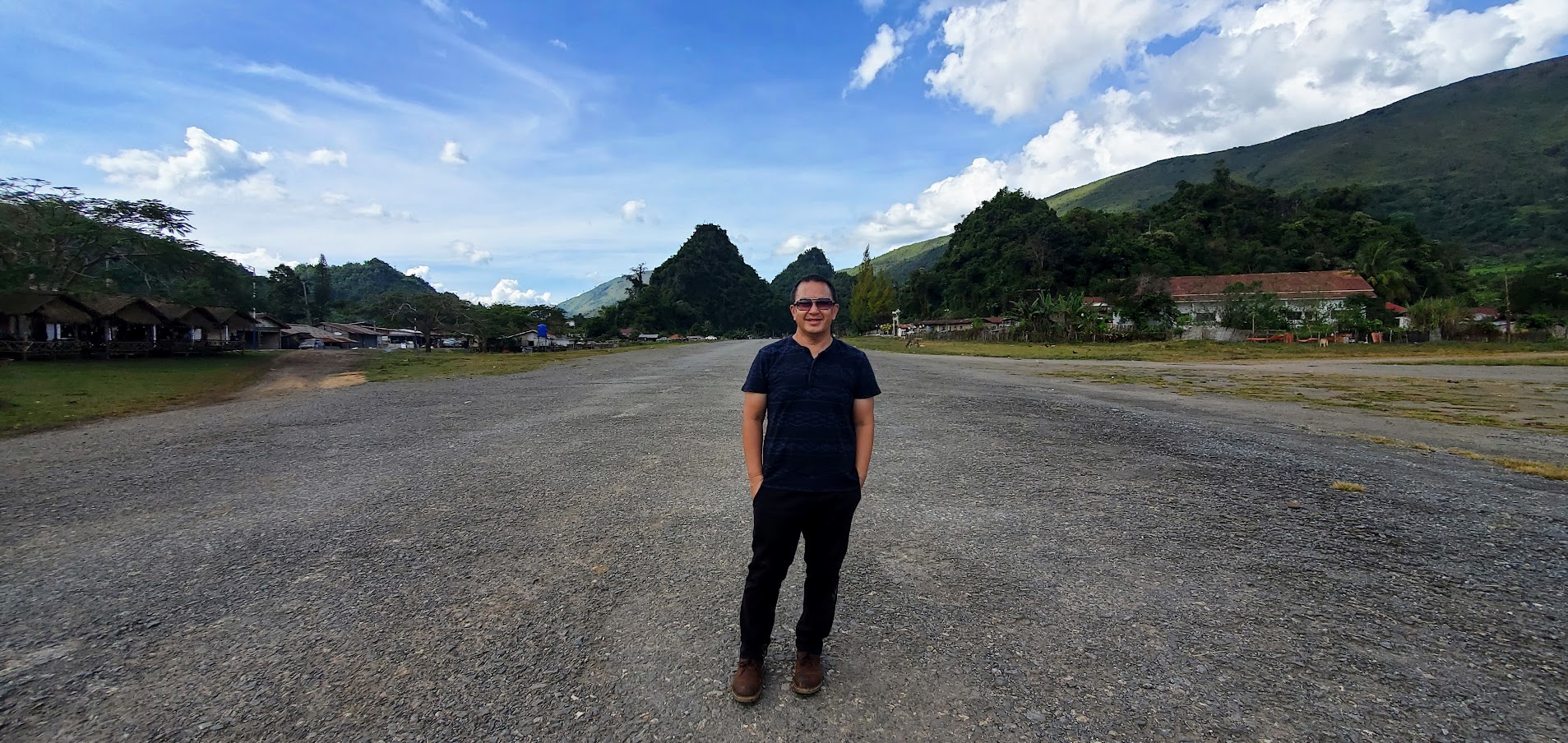 Pao Lor stands on the United States' airstrip in Long Cheng, Laos in November 2022. (Courtesy of Pao Lor)
