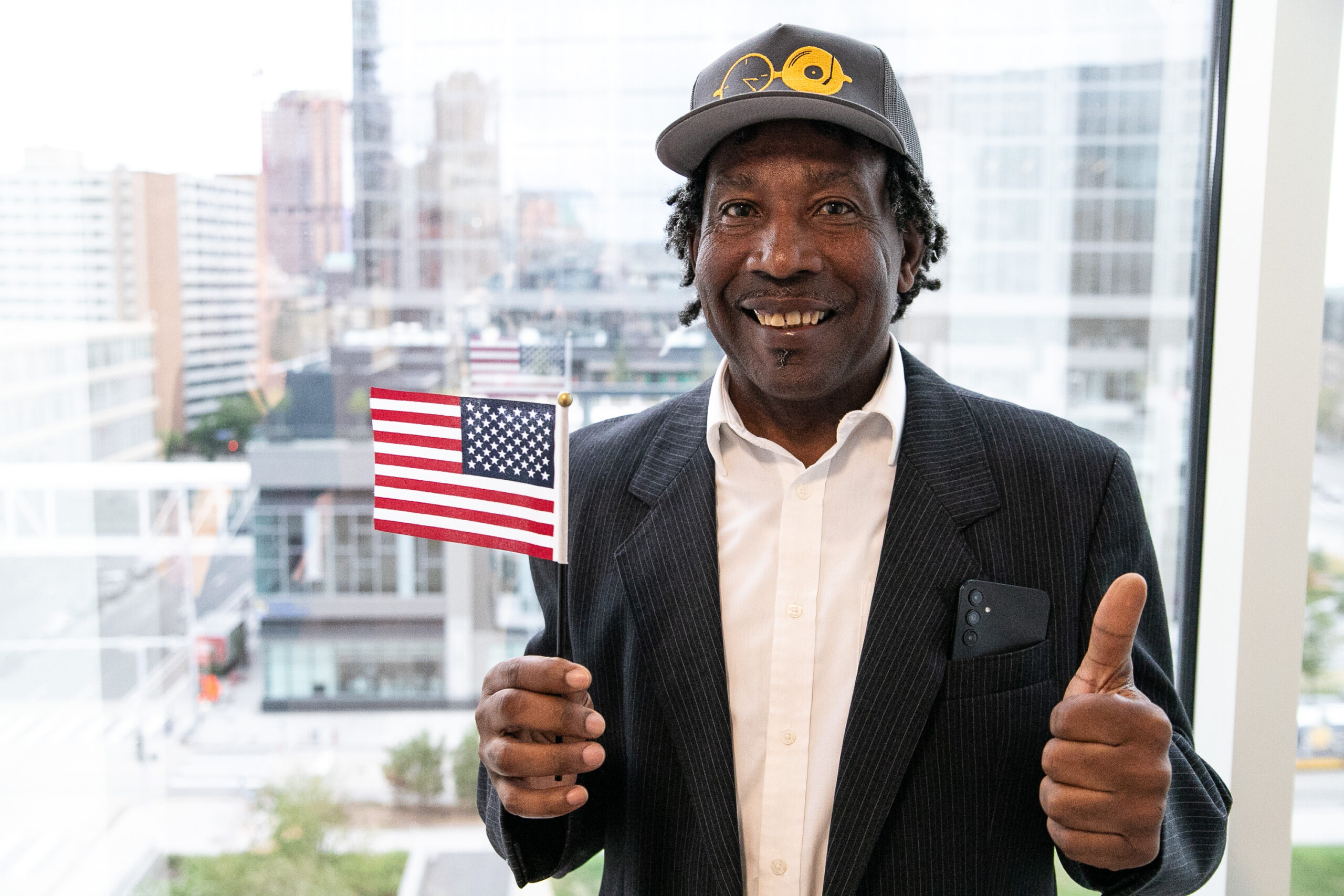 Ernesto Rodriguez of La Crosse, Wisconsin became a U.S. citizen on September 7, 2023 in Minneapolis, Minnesota. He's lived in the Upper Midwest since leaving Cuba in 1980 following the Mariel boatlift. His story is featured on the podcast "WPR Reports: Uprooted." (Mark Riechers/WPR)