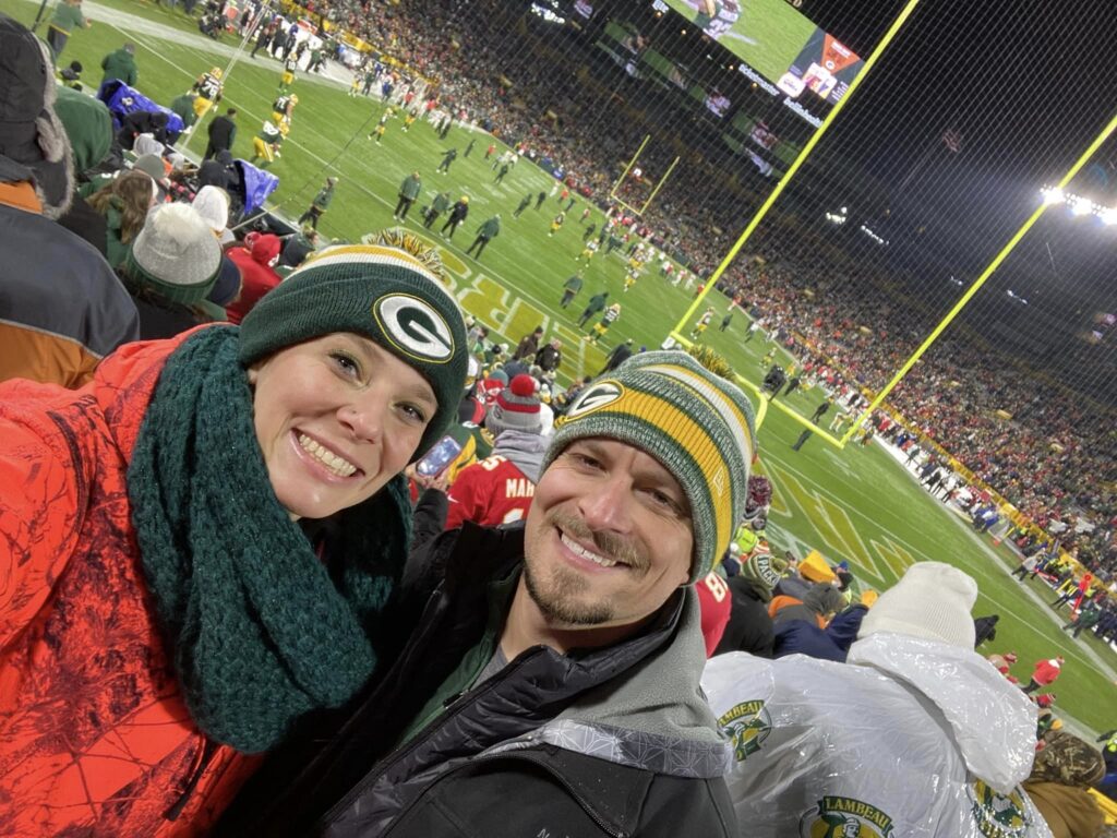 Molly Schroeder Linzmeier and her husband, Jason Linzmeier, at Lambeau Field on December 3, 2023 when the Green Bacy Packers beat the Kansas City Chiefs 27-19. (Courtesy of Molly Schroeder-Linzmeier)