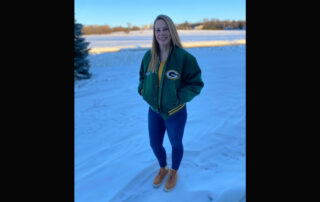Molly Schroeder-Linzmeier is one of the 538,967 shareholders of the Green Bay Packers. The former Brown County librarian talked about about this with her coworker during a StoryCorps Mobile Tour stop in Green Bay, Wisconsin in 2023. (Photo courtesy of Molly Schroeder-Linzmeier)