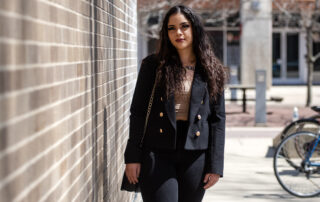 Katalina Sanchez, owner of Graffiti Nail Salon, on the UW-Madison campus just before recording her "Wisconsin Life" and Midwest Mujeres story on April 13, 2023. (Angela Major/WPR)