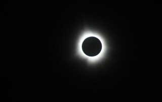 Like many Wisconsinites, WPR's Rich Kremer traveled south to witness the total eclipse with a group of friends and family. He took this photo of the totality in Cataract Falls State Park in Spencer, Indiana on April 8, 2024. (Rich Kremer/WPR)