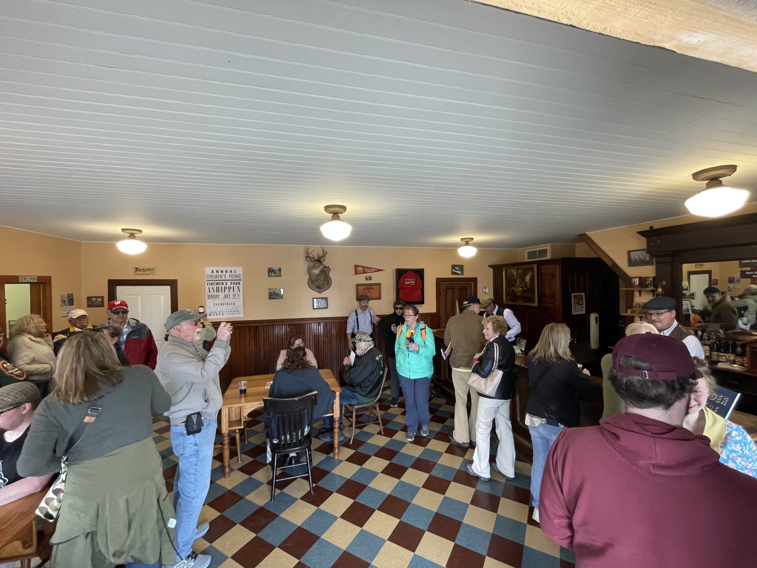 Visitors take in the restored Wittnebel's Tavern at Old World Wisconsin on May 17, 2025. Nick Rommel/WPR